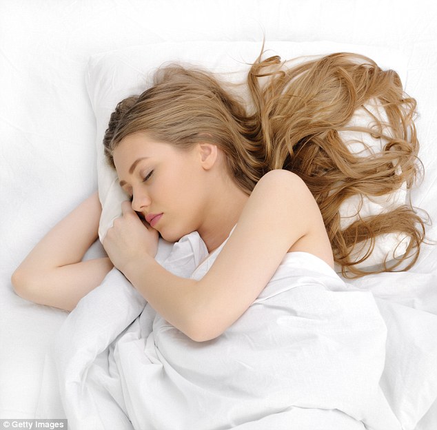 Drinking large amounts of water towards the end of the day can also end up disrupting your sleep as you may end up having to get up in the small hours to go to the bathroom (picture posed by model)