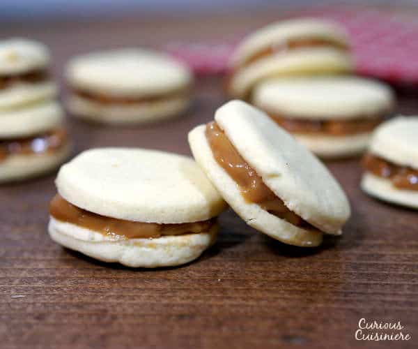 Creamy dulce de leche, sandwiched between two crisp and buttery shortbread cookies makes these Argentinian Alfajores a recipe worth indulging in for the holidays. 